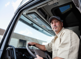 Truck driver delivering hardware